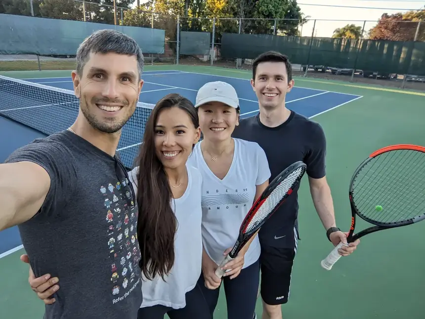 Tennis with friends on a court