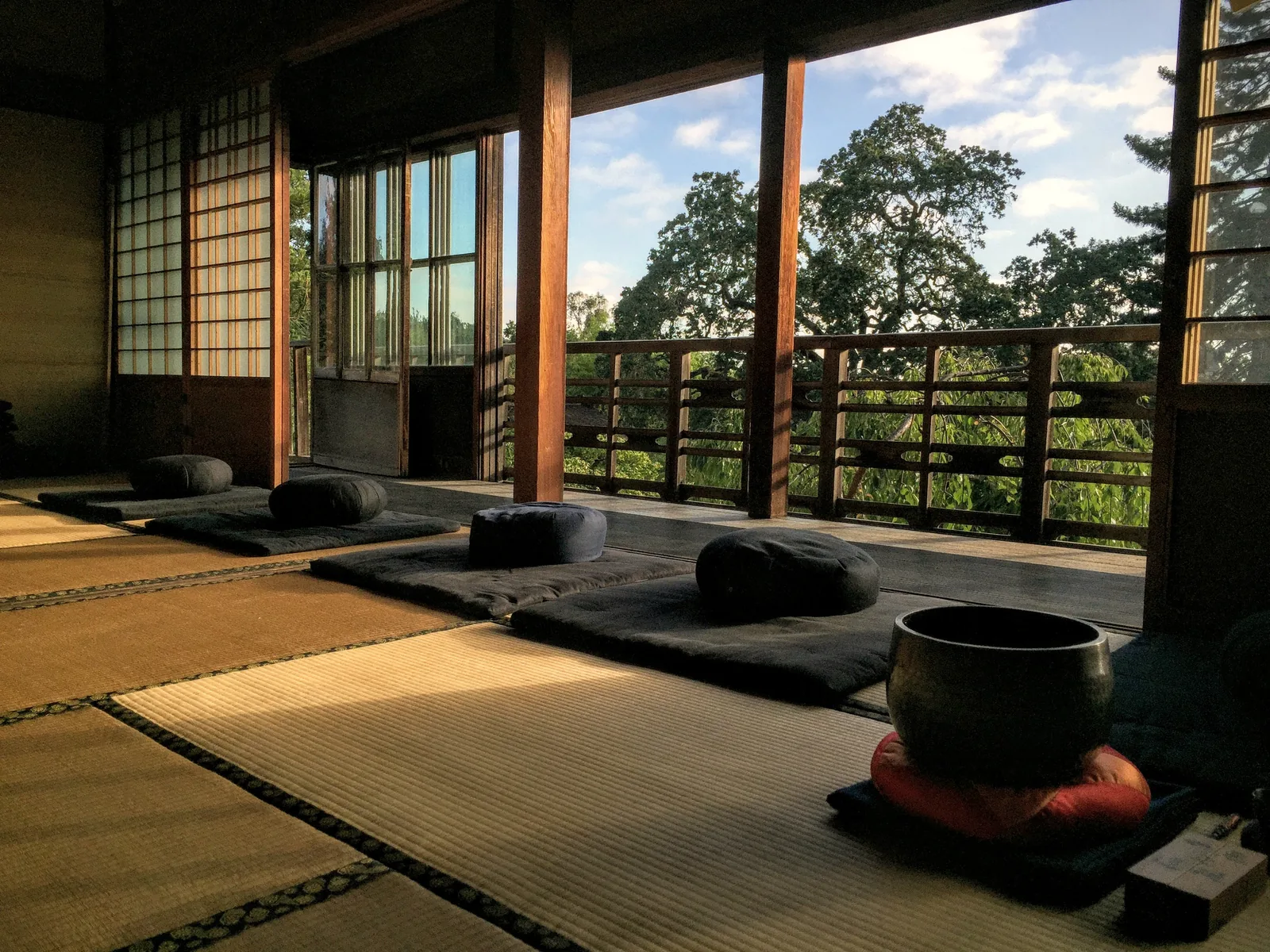 Quiet meditation room with tatami and cushions