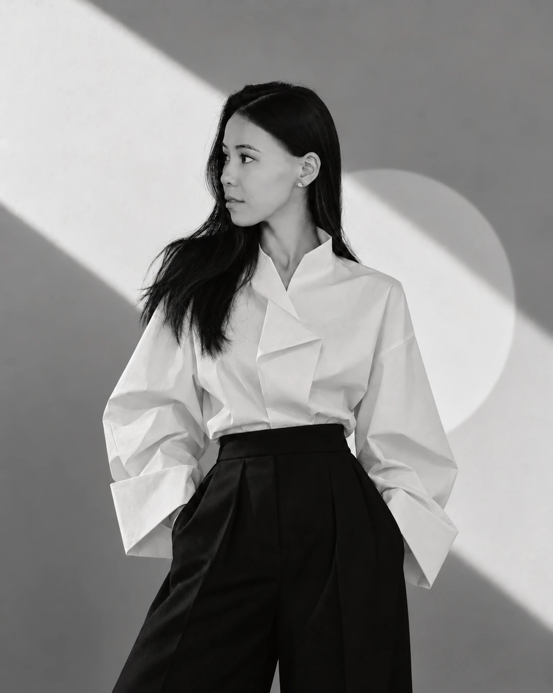 Veronika Sagadarova in a white shirt, black and white portrait